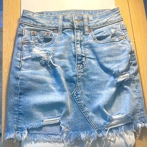 American Eagle, mini jeans skirt with super stretch. Size 0.